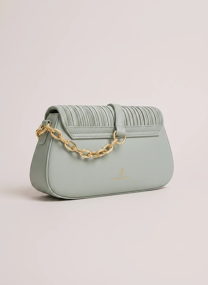 ALESSIA JADE Cypress shoulder bag in sage green with pleated texture, gold chain detail, and smooth finish.